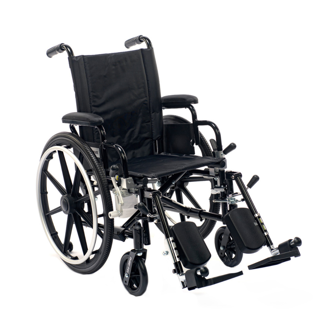 The Proactive Chariot IV XTC Pediatric Wheelchair, shown angled on a white background, features armrests, elevated footrests, large rear wheels, and black fabric seat and backrest with adjustable back height.